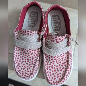 Hey Dude Women's Cream Canvas Slip-Ons with Red Heart Print